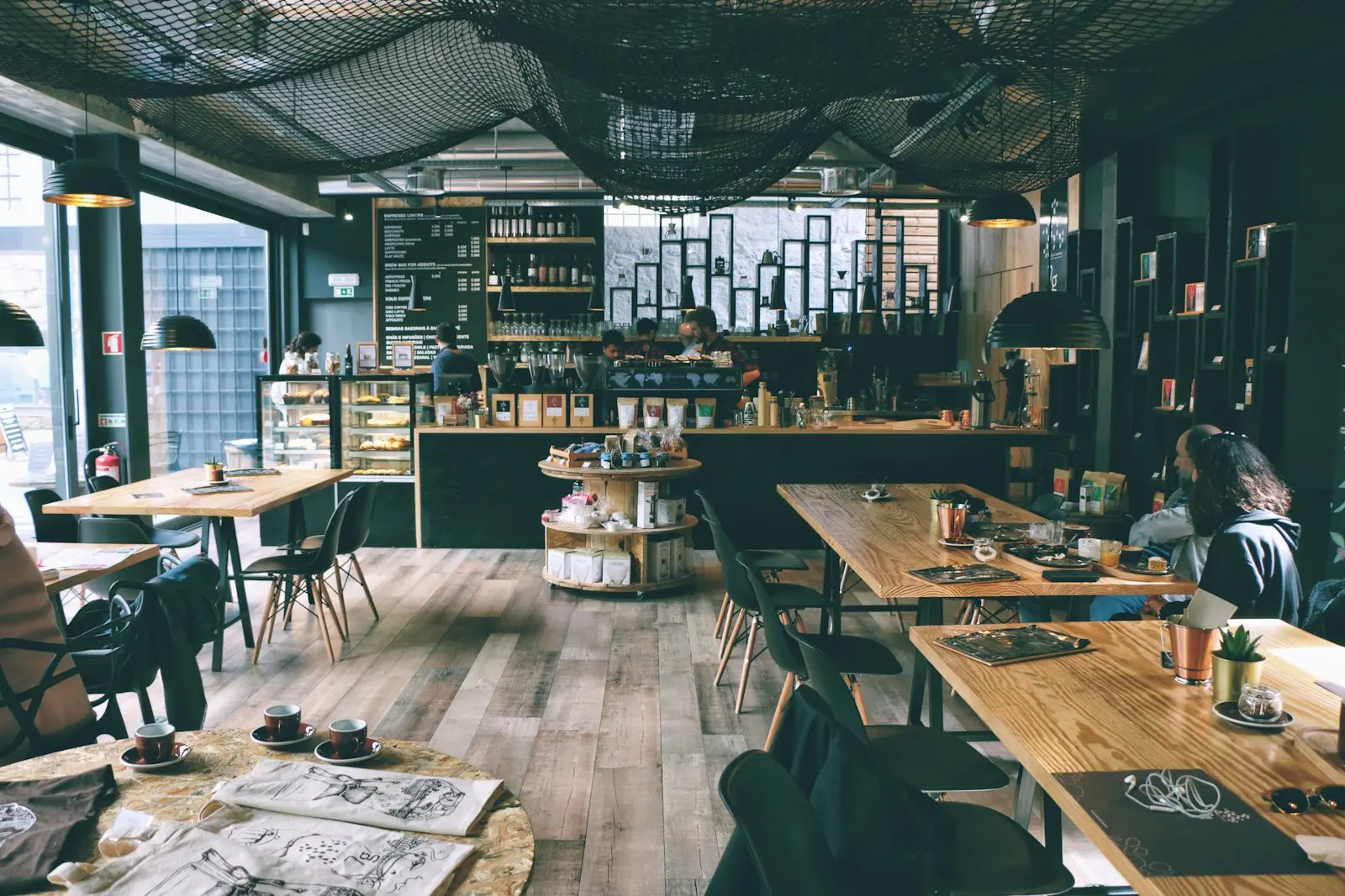 A café counter with the till ready for service